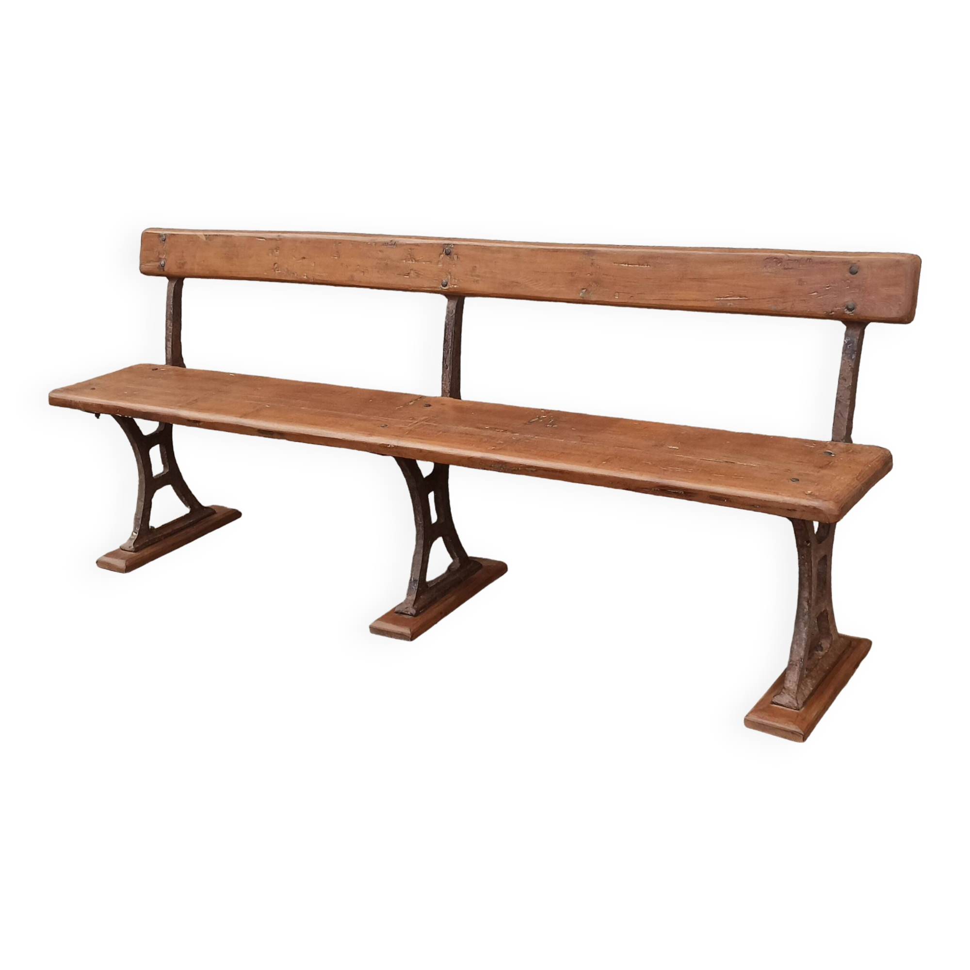 Old wooden bench with cast iron base