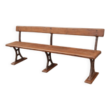 Old wooden bench with cast iron base