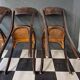 Suite de 4 anciennes chaises Bistrot Baumann Vintage Année 50