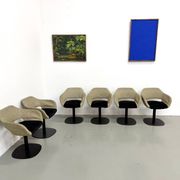 Series of six swivel chairs with organic shell, mottled fabric and base dis