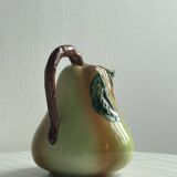Ceramic pitcher in the shape of a slip pear.