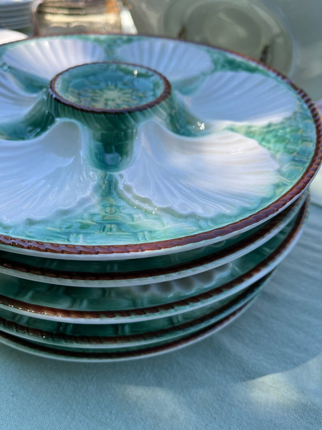 6 Longchamps shell-patterned earthenware plates