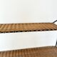 Raoul Guys rattan wall shelf 1950