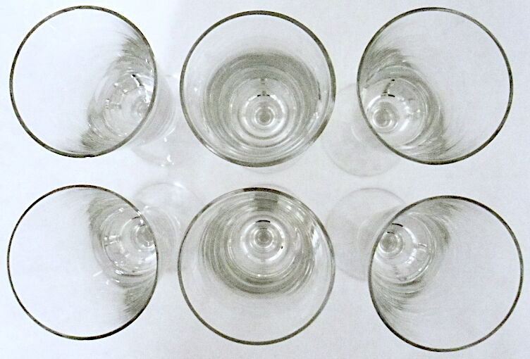 Suite of six former crystal champagne flutes
