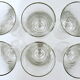 Suite of six former crystal champagne flutes
