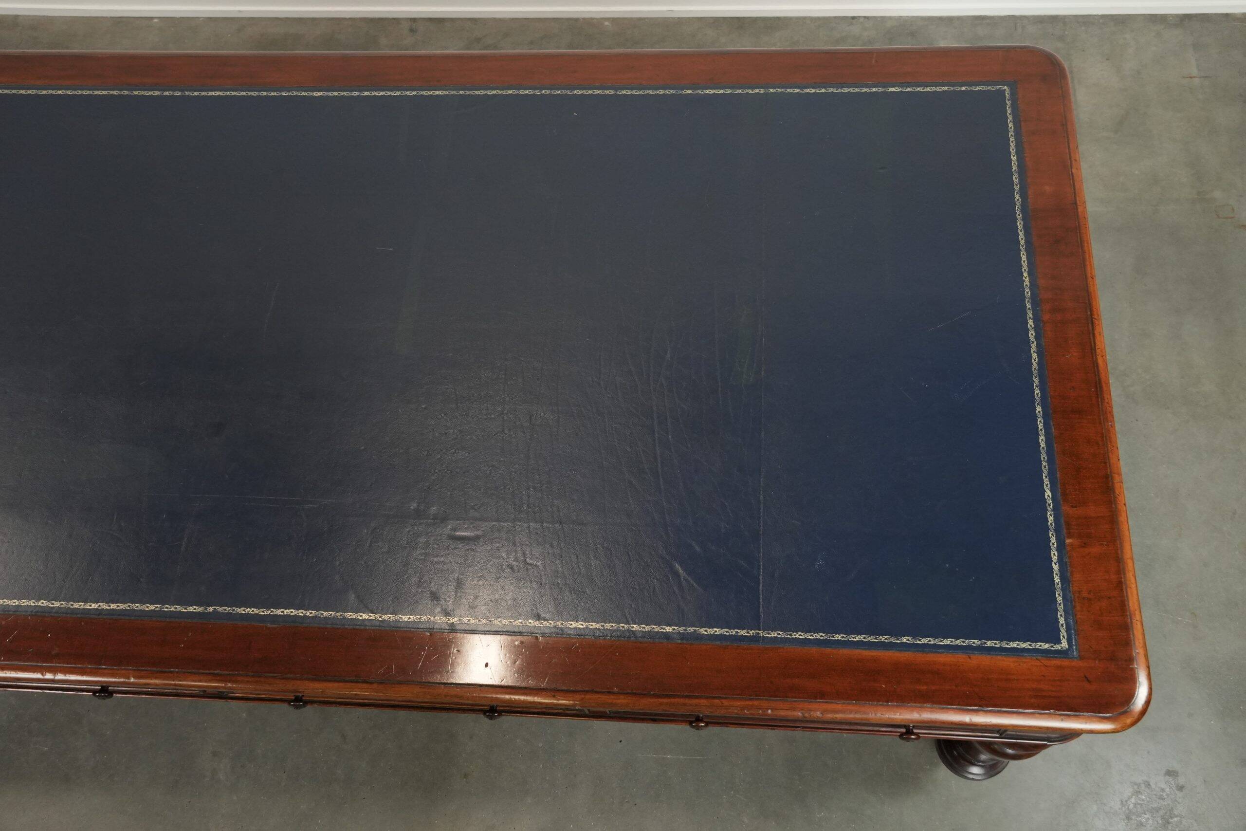 Antique English library table / writing table / desk from the 19th century