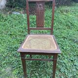 Pair of wooden and cane chairs