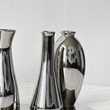 Silver soliflore vases.
