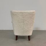 Danish lounge chair with new curly fur upholstery