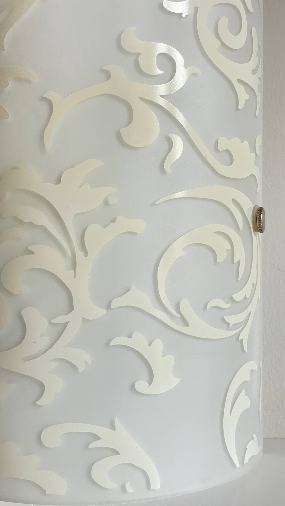 Polished and screen-printed glass sconce by eglo