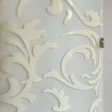 Polished and screen-printed glass sconce by eglo
