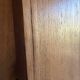 Art deco wardrobe in raw oak with bevelled mirror.