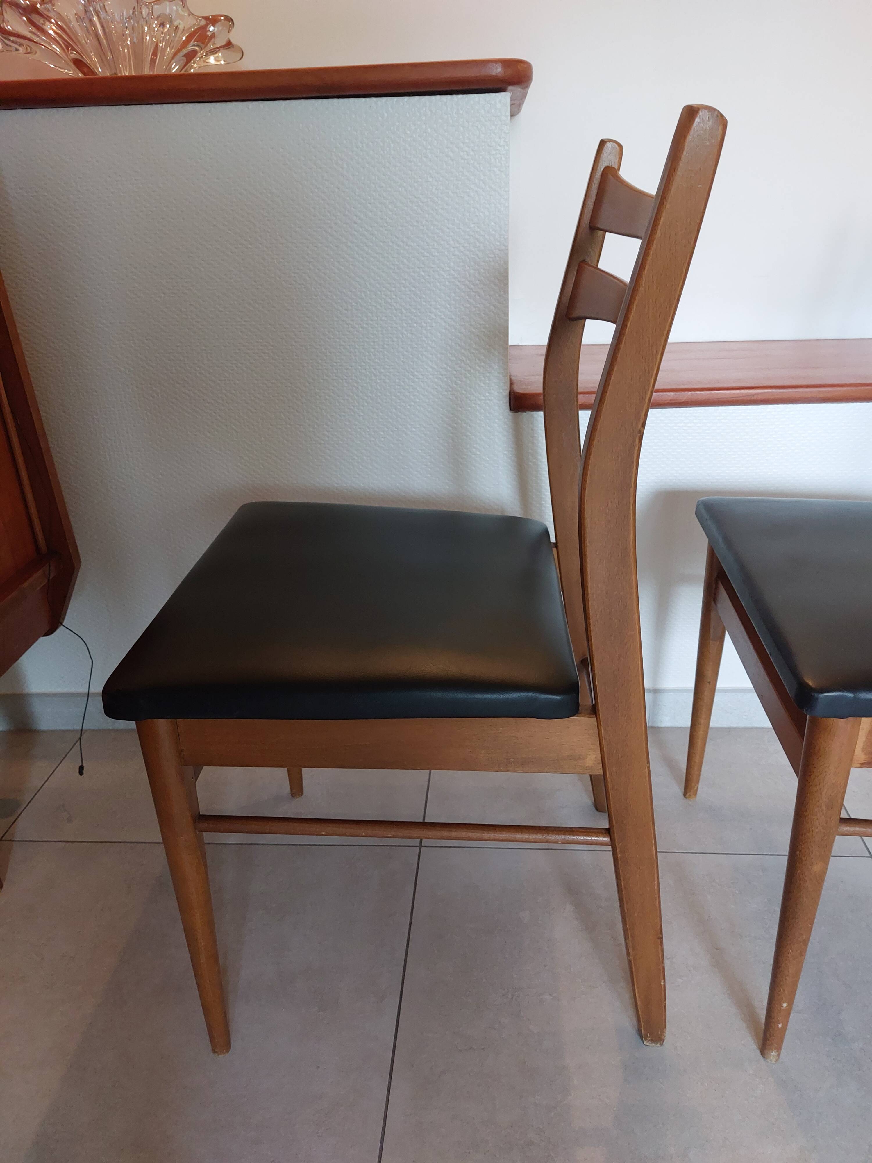 5 Scandinavian style chairs, wood and black faux leather.