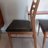 5 Scandinavian style chairs, wood and black faux leather.