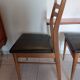5 Scandinavian style chairs, wood and black faux leather.