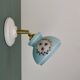Vintage wall sconce with blue opaline glass shade and floral decorations