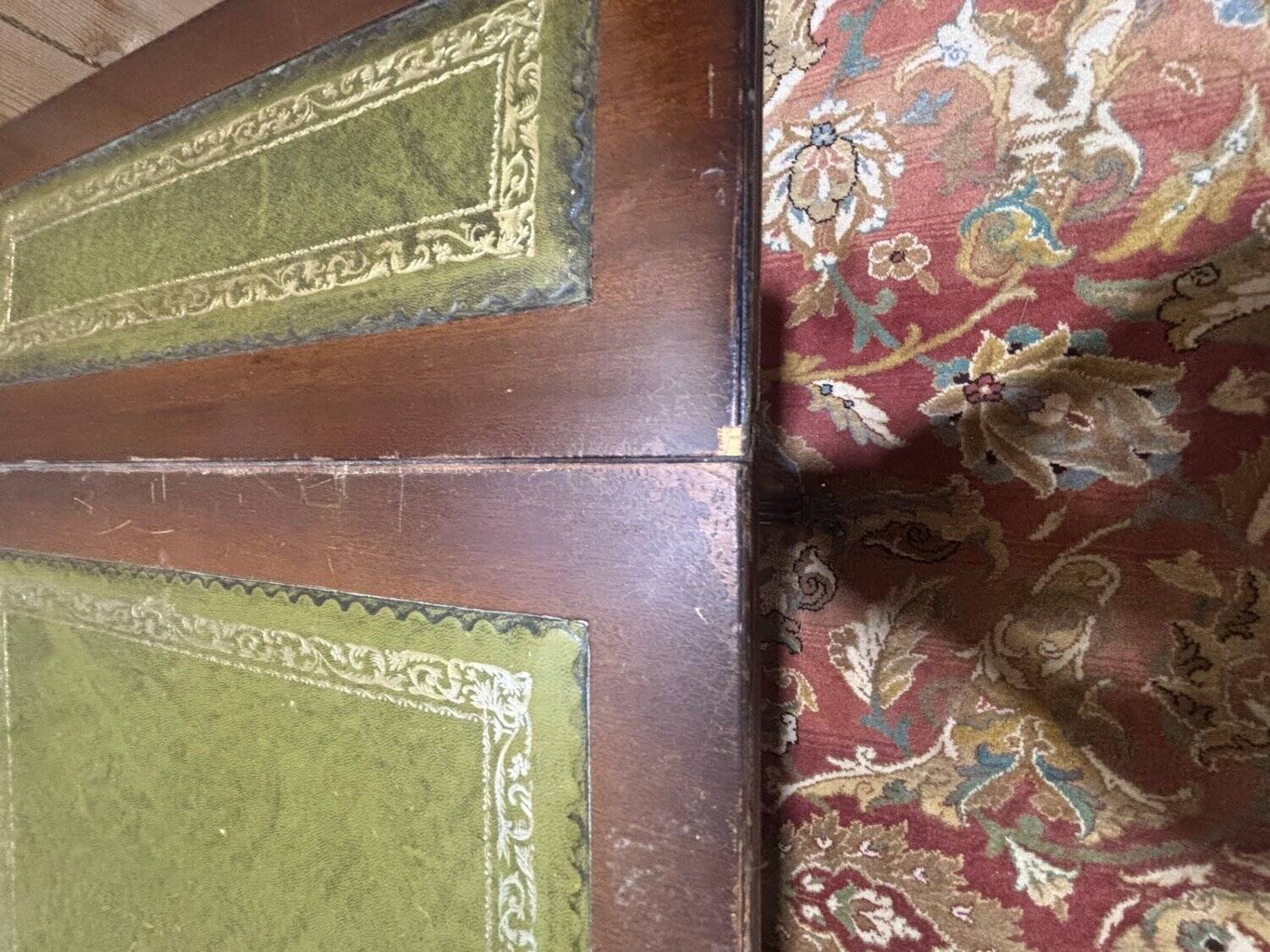 English Regency coffee table, mahogany & green stamped leather with gold.