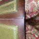 English Regency coffee table, mahogany & green stamped leather with gold.