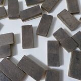 Antique set of dominoes made of bone and wood