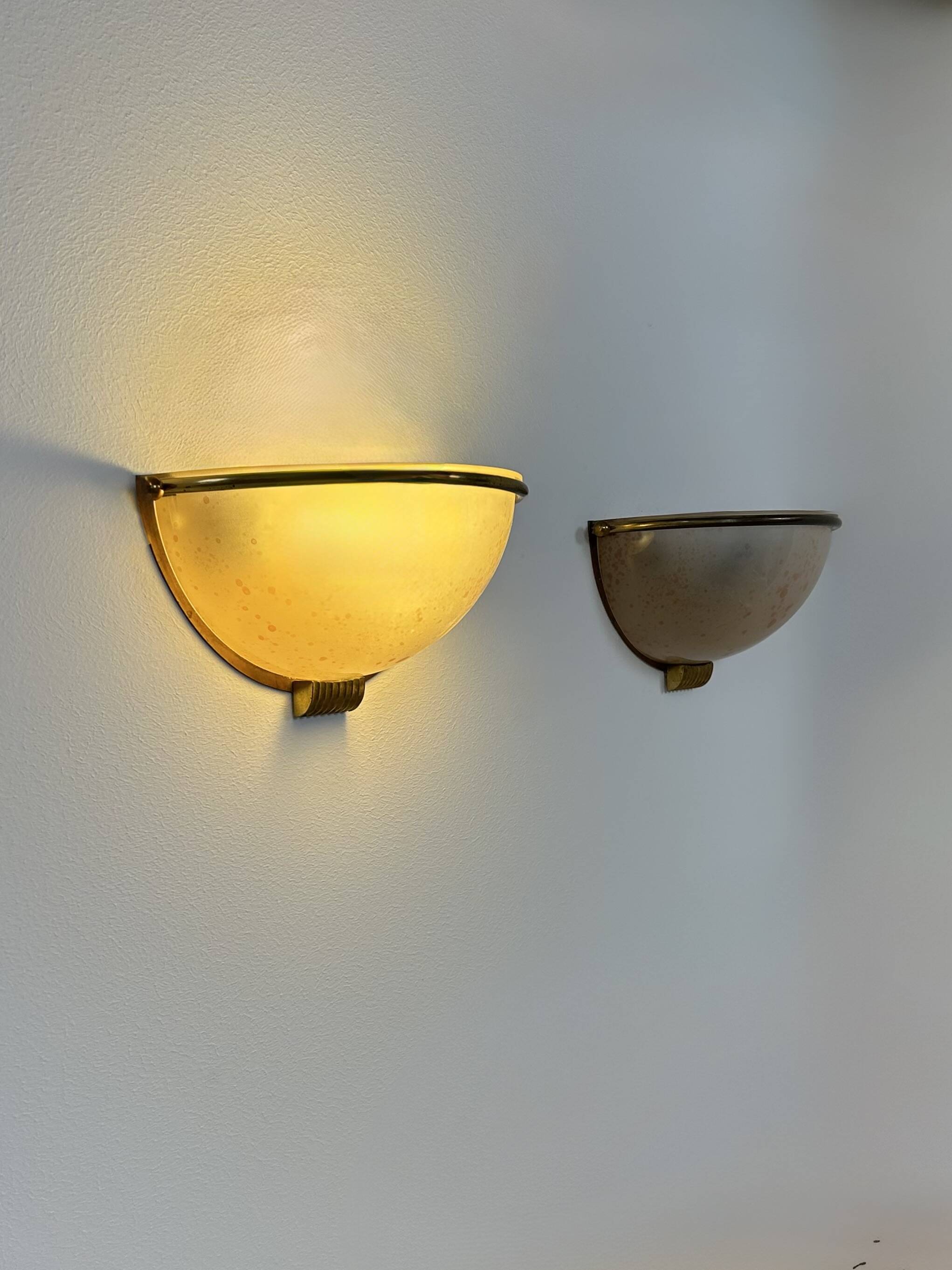 Vintage wall lights, brass and perspex, France, 1970.