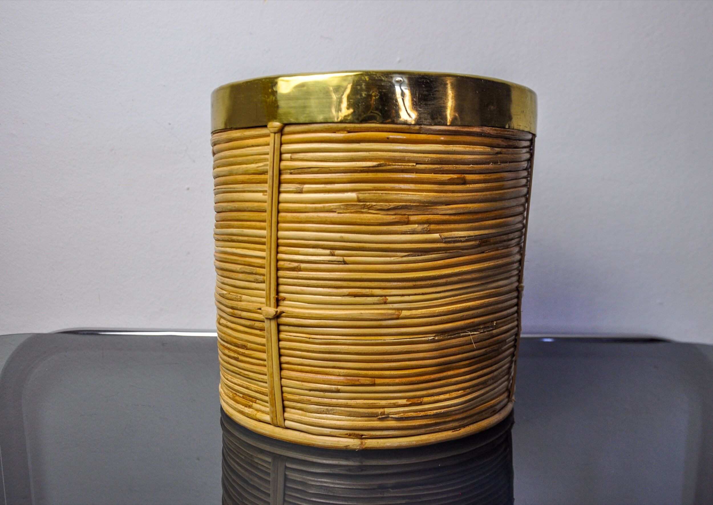 Rattan and brass book basket, Italy, 1970