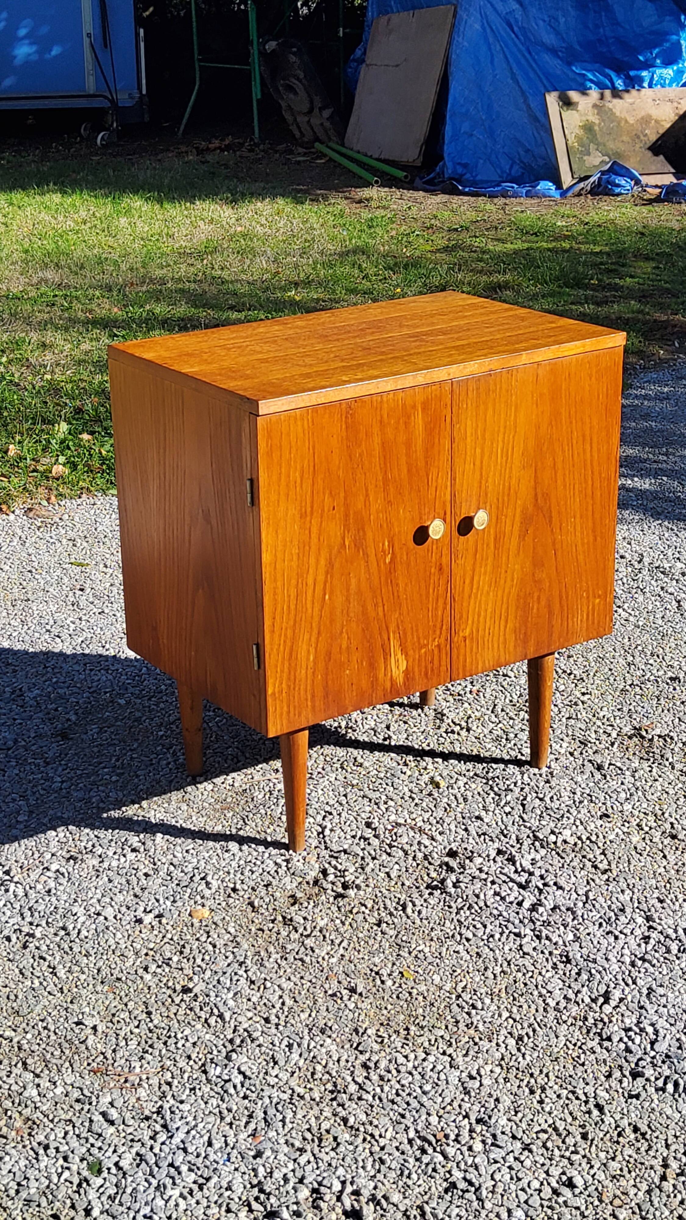 Vintage golden oak sideboard with conical legs from the 1950s