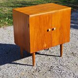 Vintage golden oak sideboard with conical legs from the 1950s