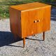 Vintage golden oak sideboard with conical legs from the 1950s