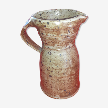 Ancient pitcher in speckled grey sandstone
