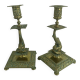 Pair of brass dolphin candlesticks, late 19th century, Napoleonic period