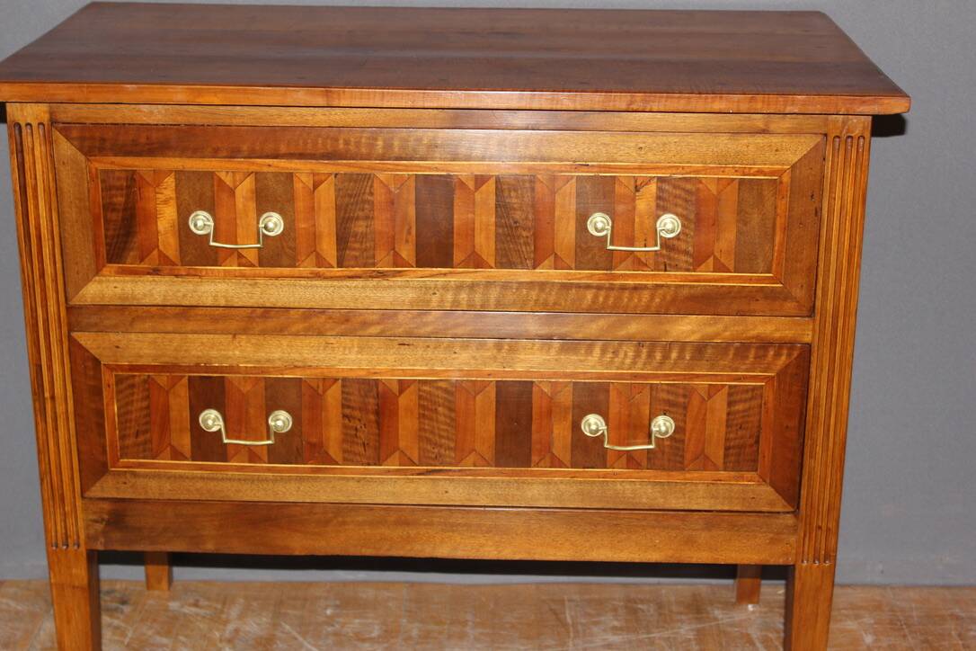 Louis XVI style chest of drawers in walnut and 19th century marquetry
