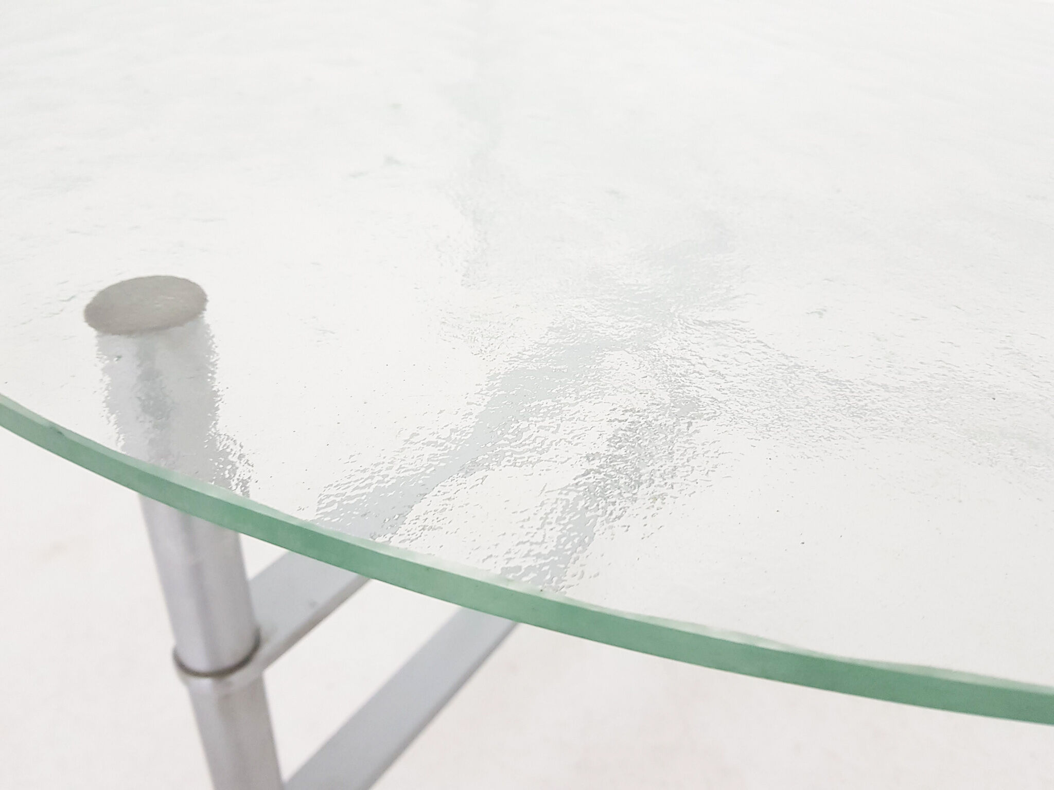 Mid-century round glass and chrome coffee table