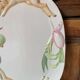 Very large serving dish with hares and vegetables.