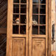 Antique glass-fronted cabinet in raw solid oak: display cabinet bookshelf.