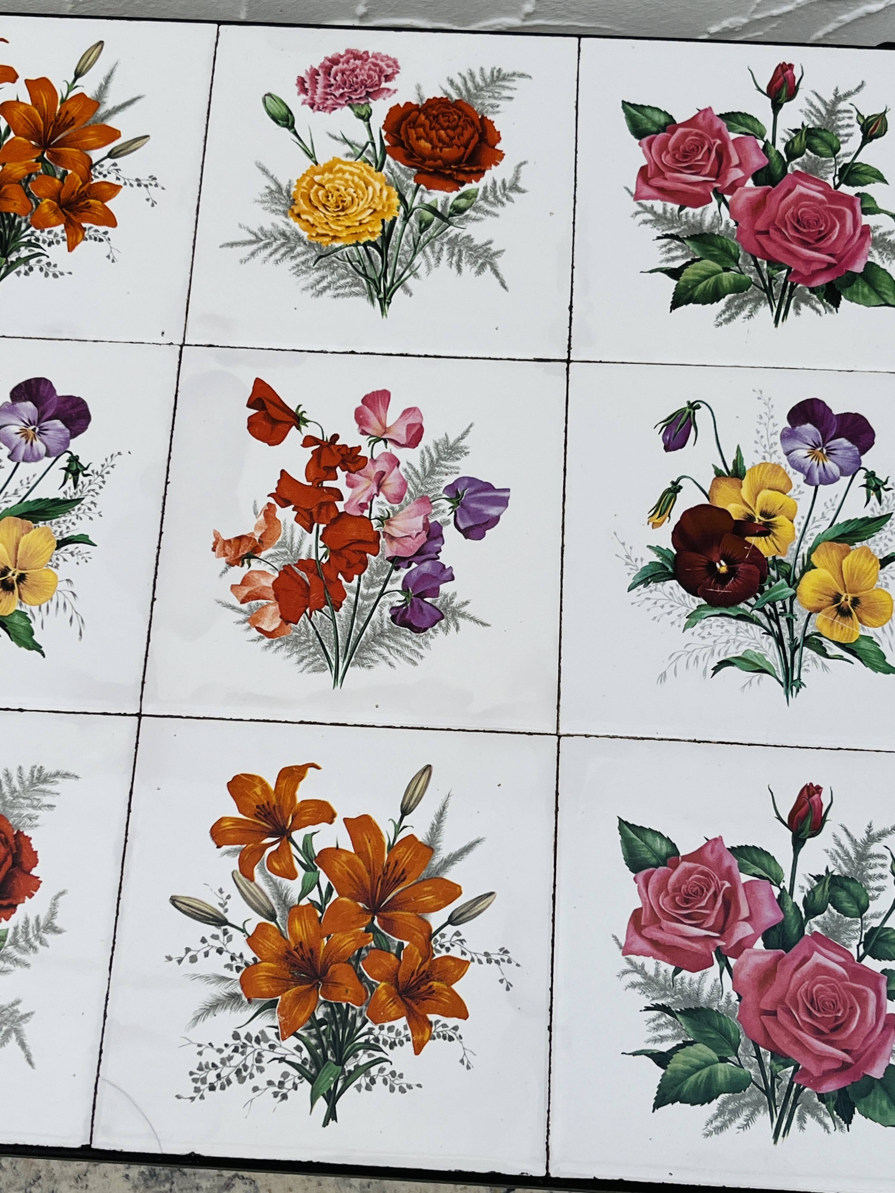 Vintage coffee table in wrought iron with floral tiles.