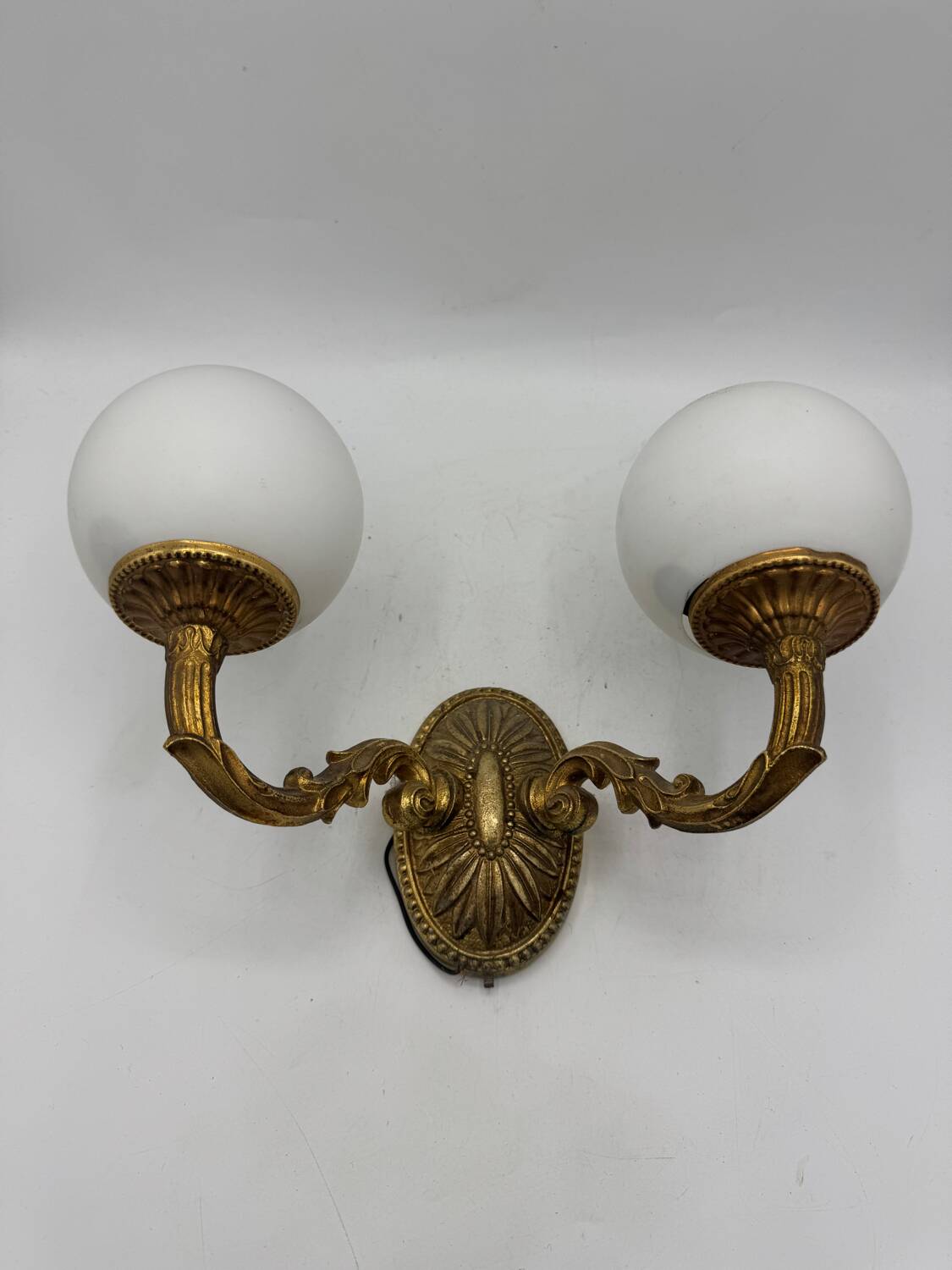 Double gold wall light