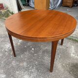 Round teak dining table