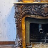 Cheminée en marbre et son trumeau en bois sculpté