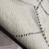 Handmade traditional Moroccan wool rug size 150 x 250 cm.