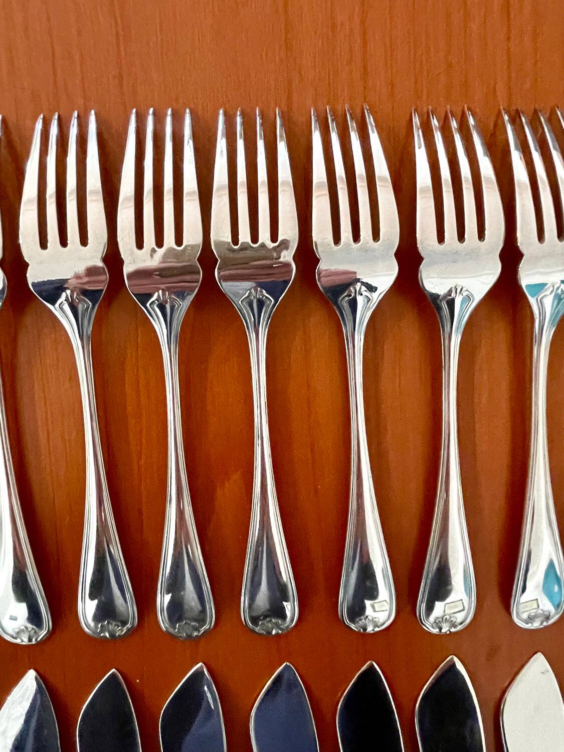 Christofle Marot Berain, 12 fish cutlery sets, shell decor