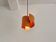 Light orange swirl shaped pendant or ceiling lamp by Simon P. Henningsen for Lyfa, Denmark 1960's