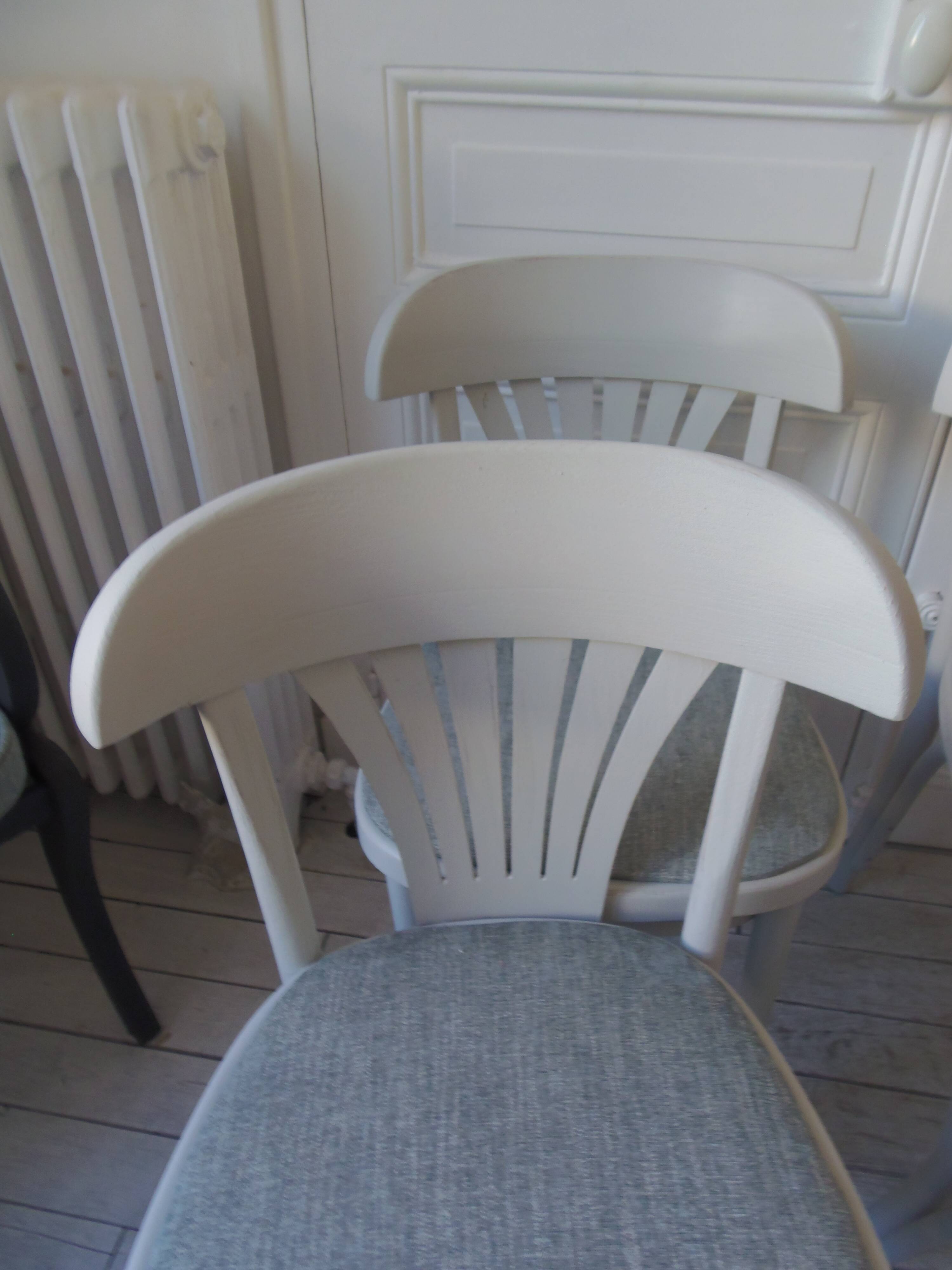 Set of 4 vintage bistro chairs enhanced in pearl grey.