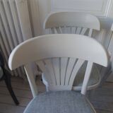 Set of 4 vintage bistro chairs enhanced in pearl grey.