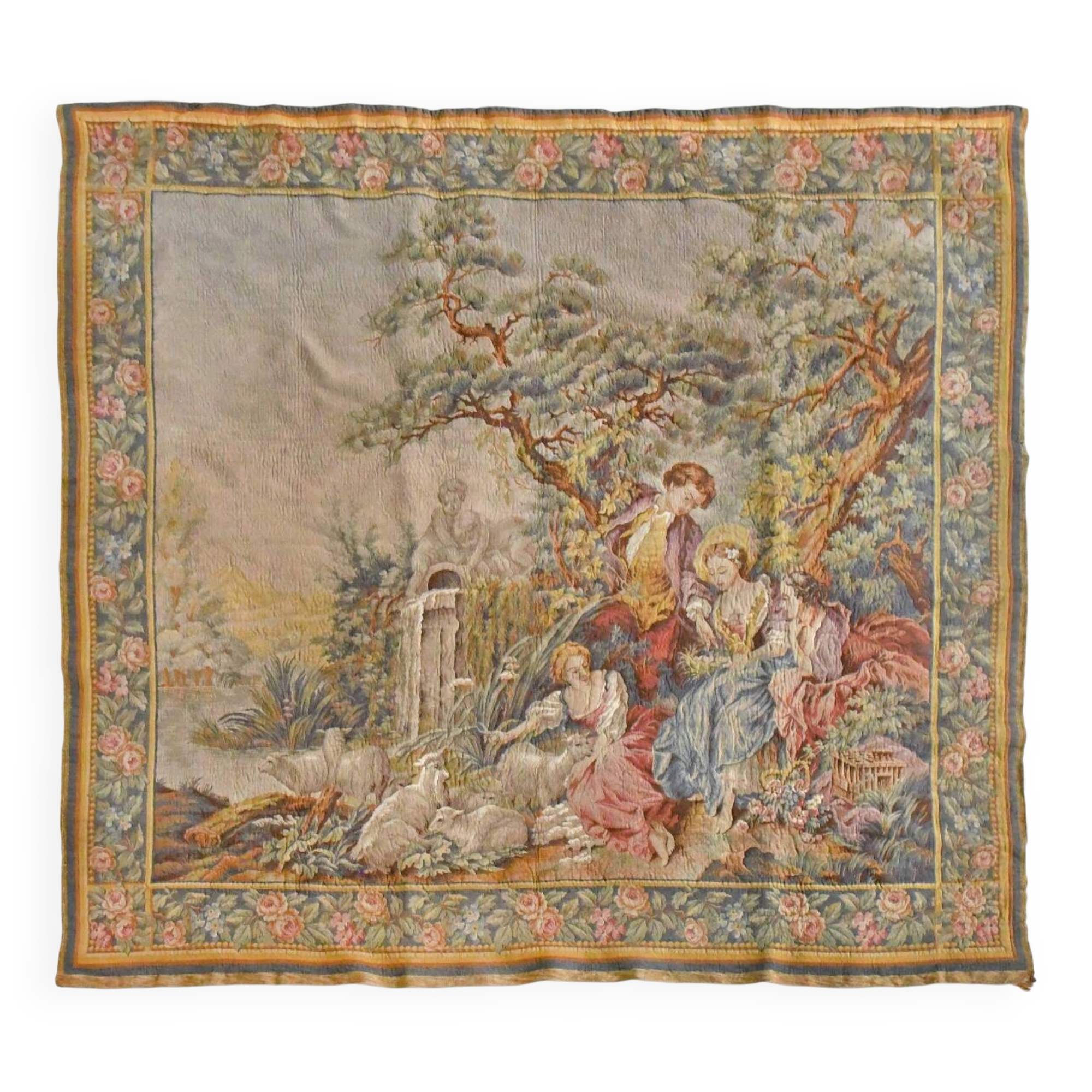 Wall tapestry featuring a pastoral scene.