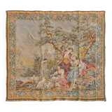 Wall tapestry featuring a pastoral scene.