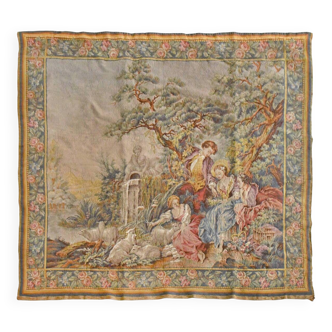 Wall tapestry featuring a pastoral scene.
