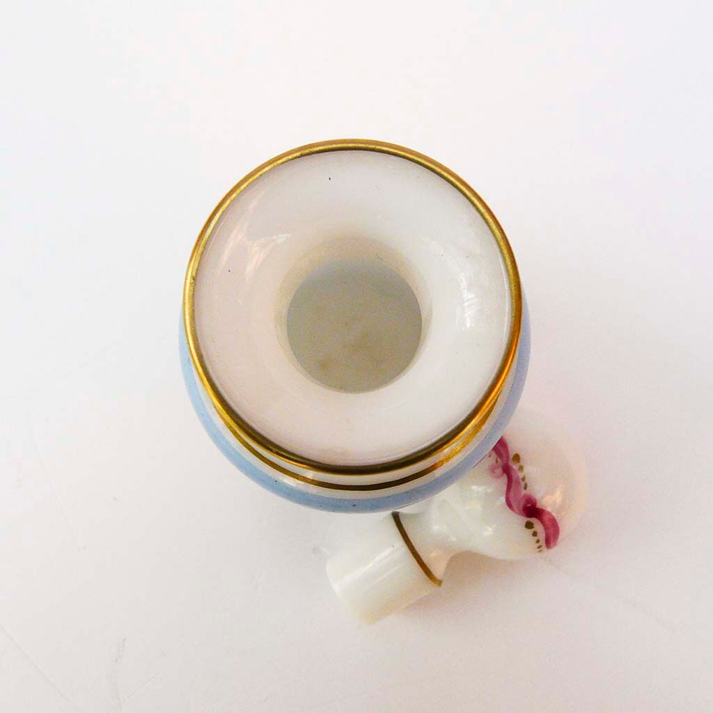 Bottle with floral decoration and antique gold edging