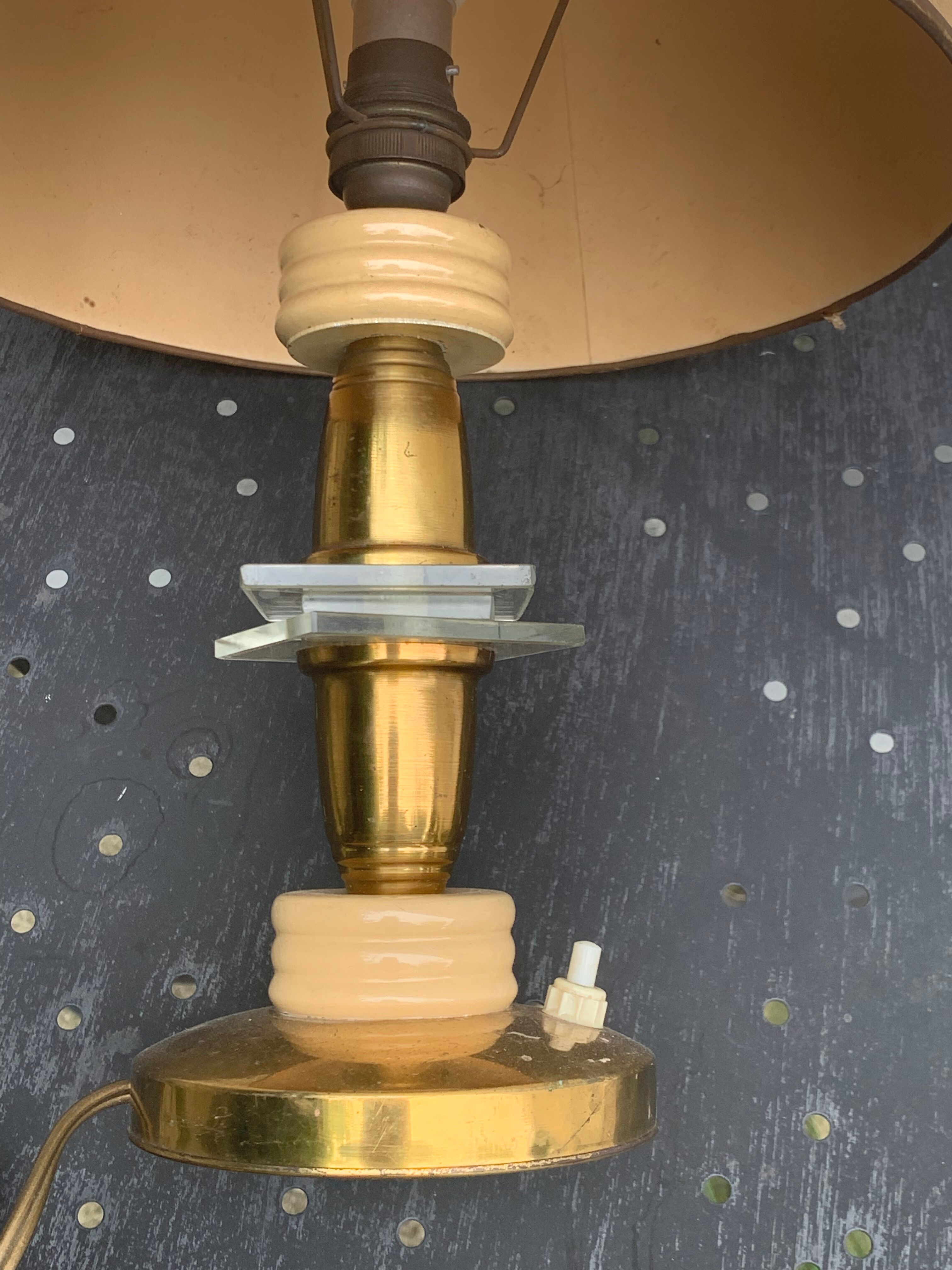 Table lamp in gilded metal, bakelite and antique plexiglass