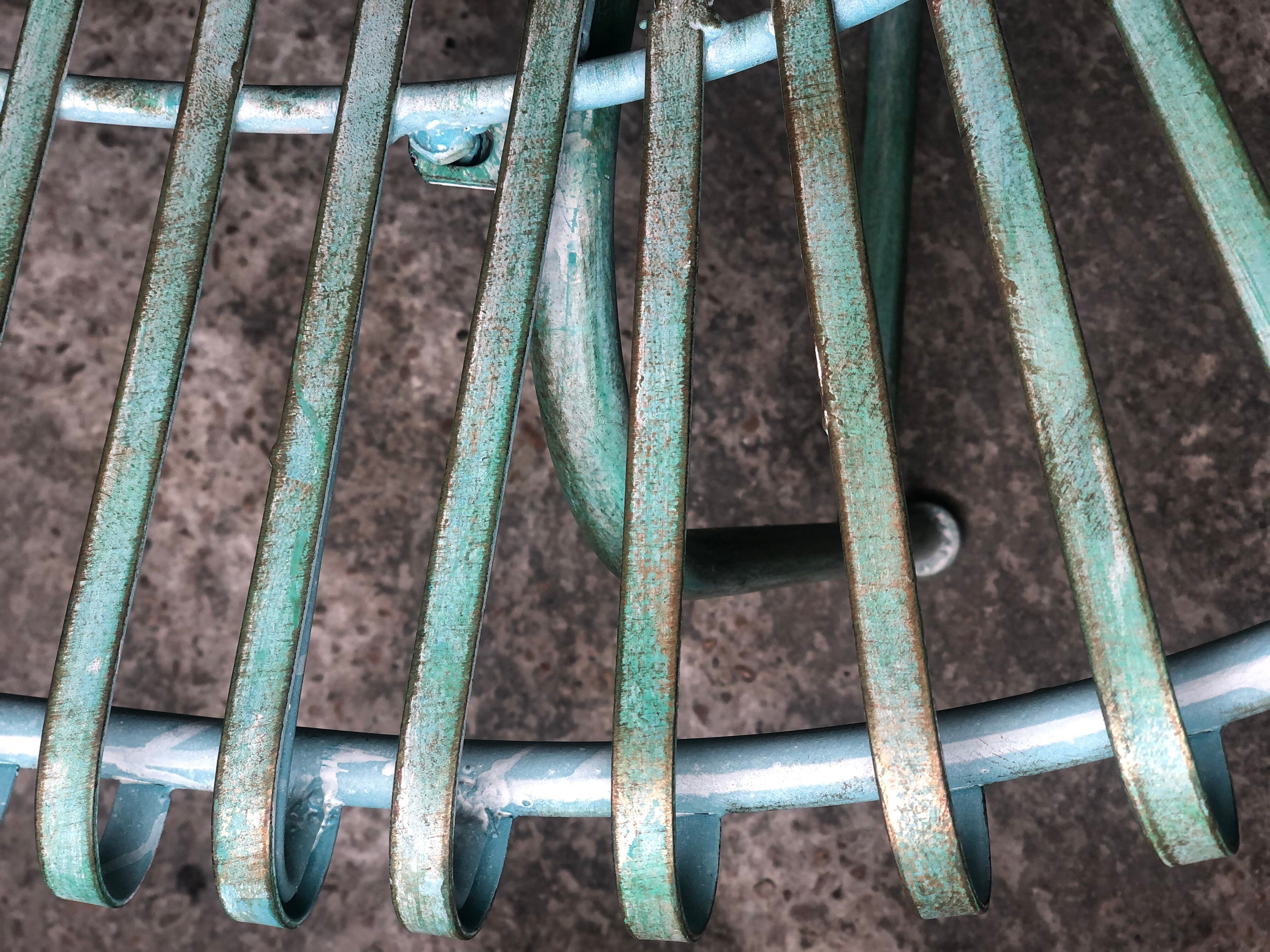 Green patinated iron garden bench