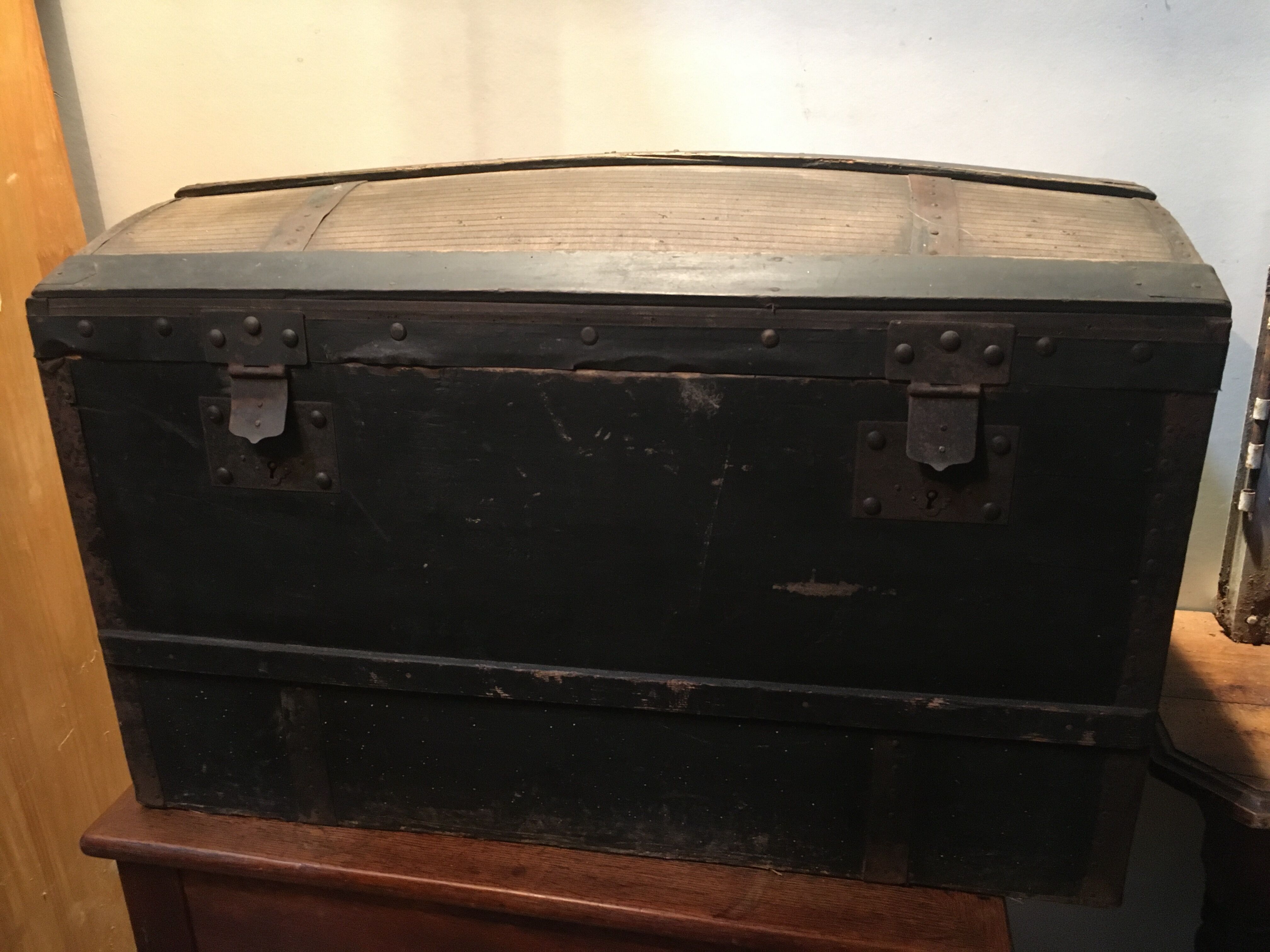 Black travel trunk with a fabric top